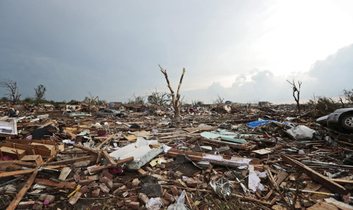 MOORE, OK - MAY 20: Debris covers the ground after a powerful tornado ripped through the area on May 20, 2013 in Moore, Oklahoma.