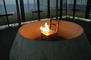 And this is the heart of the memorial: a metal chair from which flames constantly arise. — at Steilneset Memorial in Vardø, Norway.