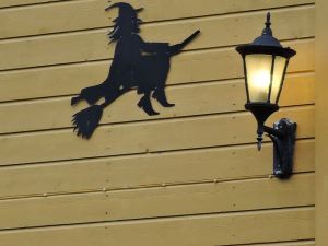 Saw this witch on the side of a house in Vardø. People here do have a connection to the memorial. Several years ago when the Norwegian national broadcaster did minute-by-minute coverage of the Hurtigruten's trip from Bergen to Kirkenes, as the ship began to enter the harbor at Vardø, a group of women dressed as witches began to dance around a huge bonfire on one arm of the quay. I think it was that sight that made me decide I had to come here. — at Vardø, Norway.
