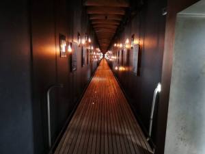 Each plaque has the name of one of the 91 who were executed here, and her/his story — at Steilneset Memorial in Vardø, Norway.